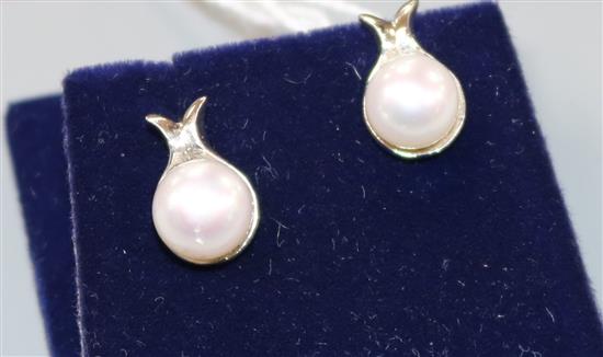 A pair of 18ct white gold and cultured pearl earrings.